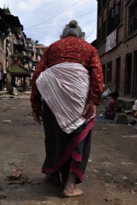 Nepali woman with tattooed legs
